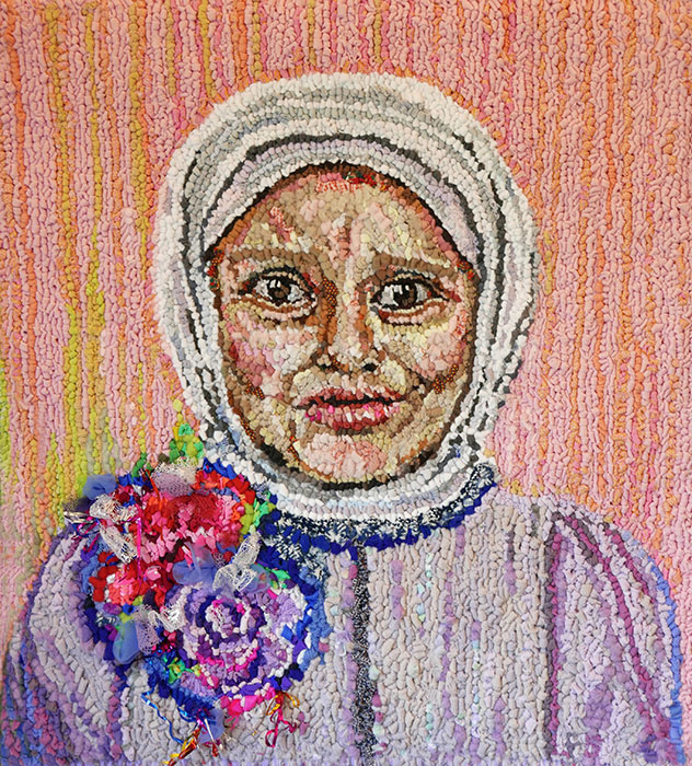“ A Corsage for Every Girl,” artist Linda Friedman Schmidt’s empathetic portrait of a muslim immigrant child, inspires empathy and unity in diversity.